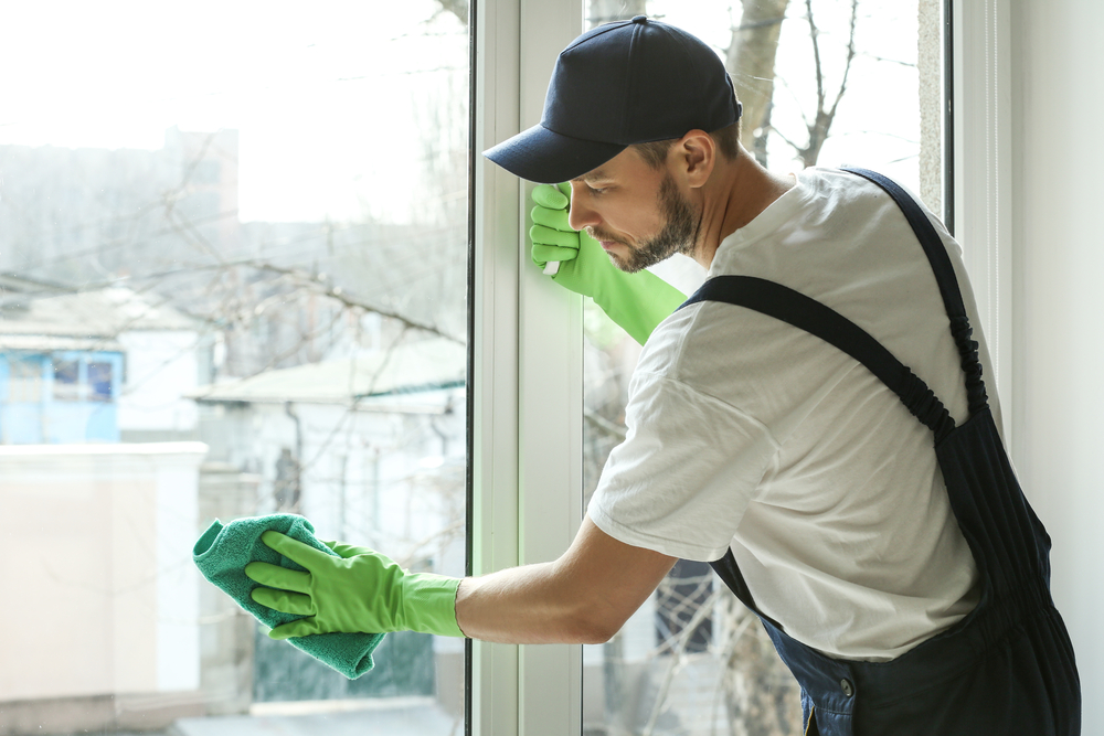 Window cleaning in the office, cleaning service provider