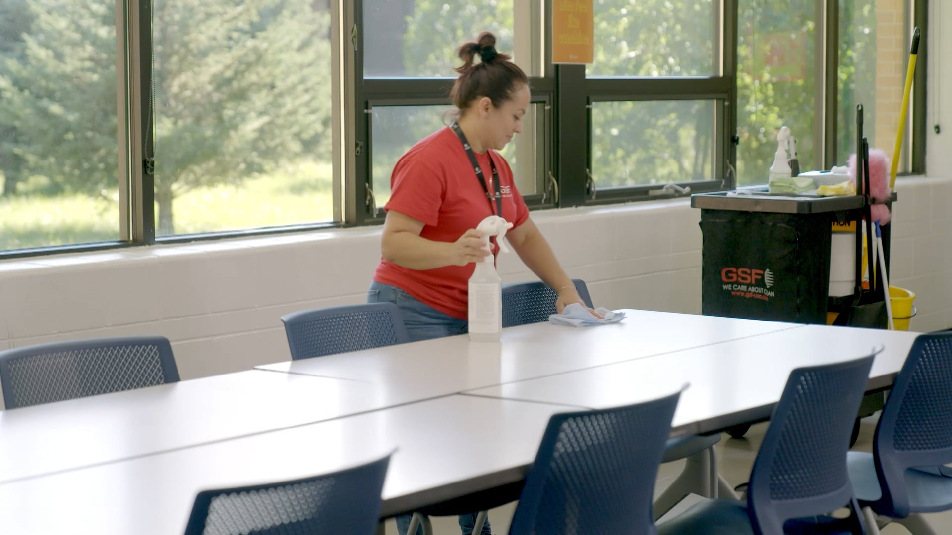 Cleaning efficiency with GSF USA cleaning, cleaning lady in GSF uniform