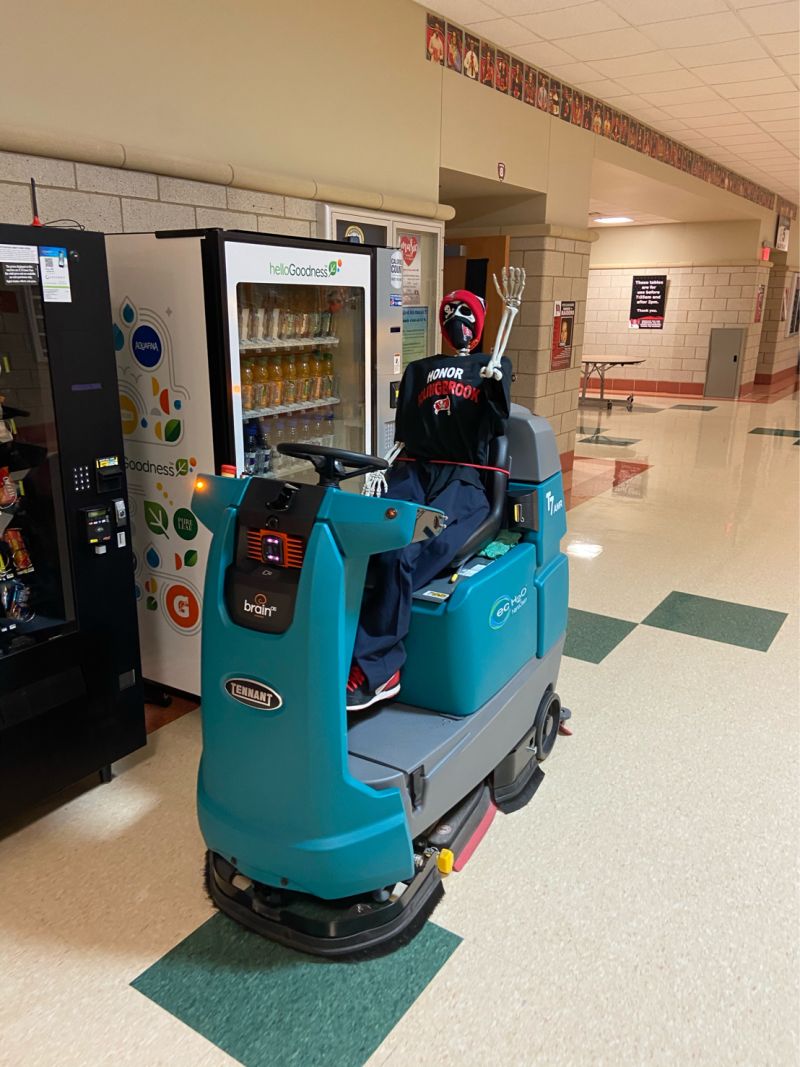 Robotic floor scrubber machine